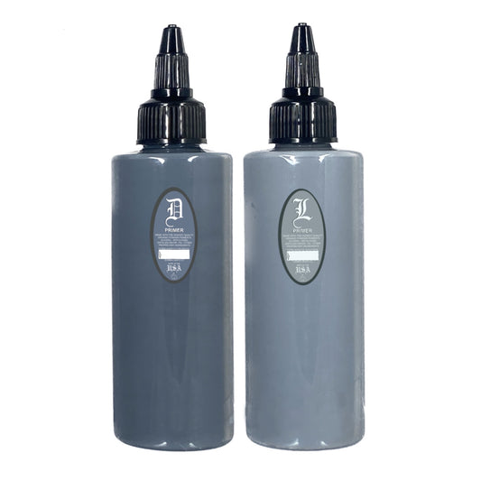 Two bottles of Primer Gray body paint in different shades, one labeled as light gray and the other as dark gray.bottle of tattoo ink. for tattooers, made in new mexico, marketed in austin texas. for black and gray tattooing Intro Sets
Magical Black
Denim Dark Wash
Denim Medium Wash
Denim Light Wash
Opaque Dark Wash
Opaque Medium Wash
Opaque Light Wash
Classic Dark Wash
Classic Medium Wash
Classic Light Wash
Stencil Majik
Primer Gray
Magical White
Purple Haze
Ghost Train Haze
Paynes Gray
Denim Wash Set
Opaqu
