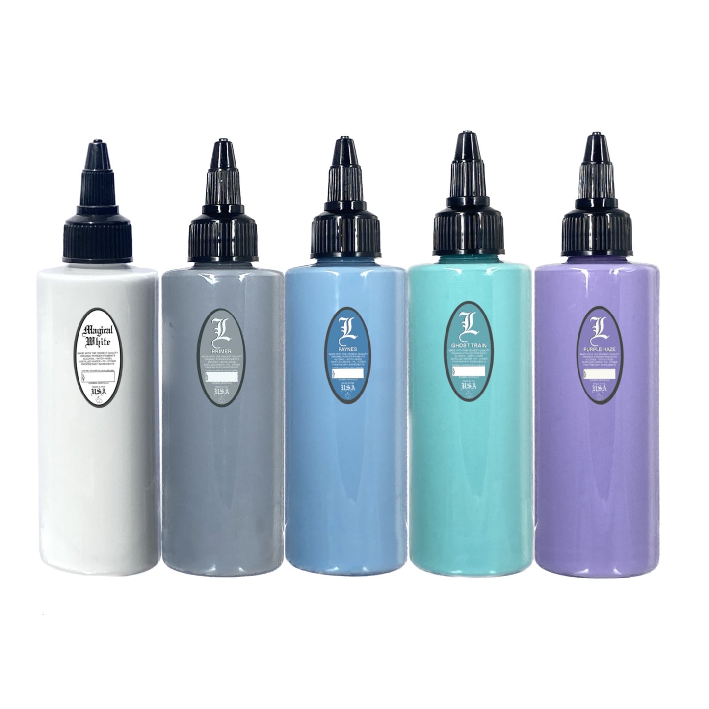 A set of five tattoo ink bottles in a line, ranging from light to dark gray tones, with labels indicating the shade.  
Intro Sets
Magical Black
Denim Dark Wash
Denim Medium Wash
Denim Light Wash
Opaque Dark Wash
Opaque Medium Wash
Opaque Light Wash
Classic Dark Wash
Classic Medium Wash
Classic Light Wash
Stencil Majik
Primer Gray
Magical White
Purple Haze
Ghost Train Haze
Paynes Gray
Denim Wash Set
Opaque Wash Set
Classic Wash Set
Dispersing Solution
